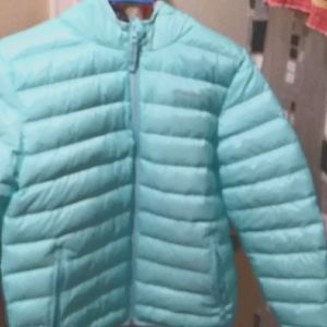 Girls Eddie bauer's reversible puffy coat,junior size 10/12 teal& some design.